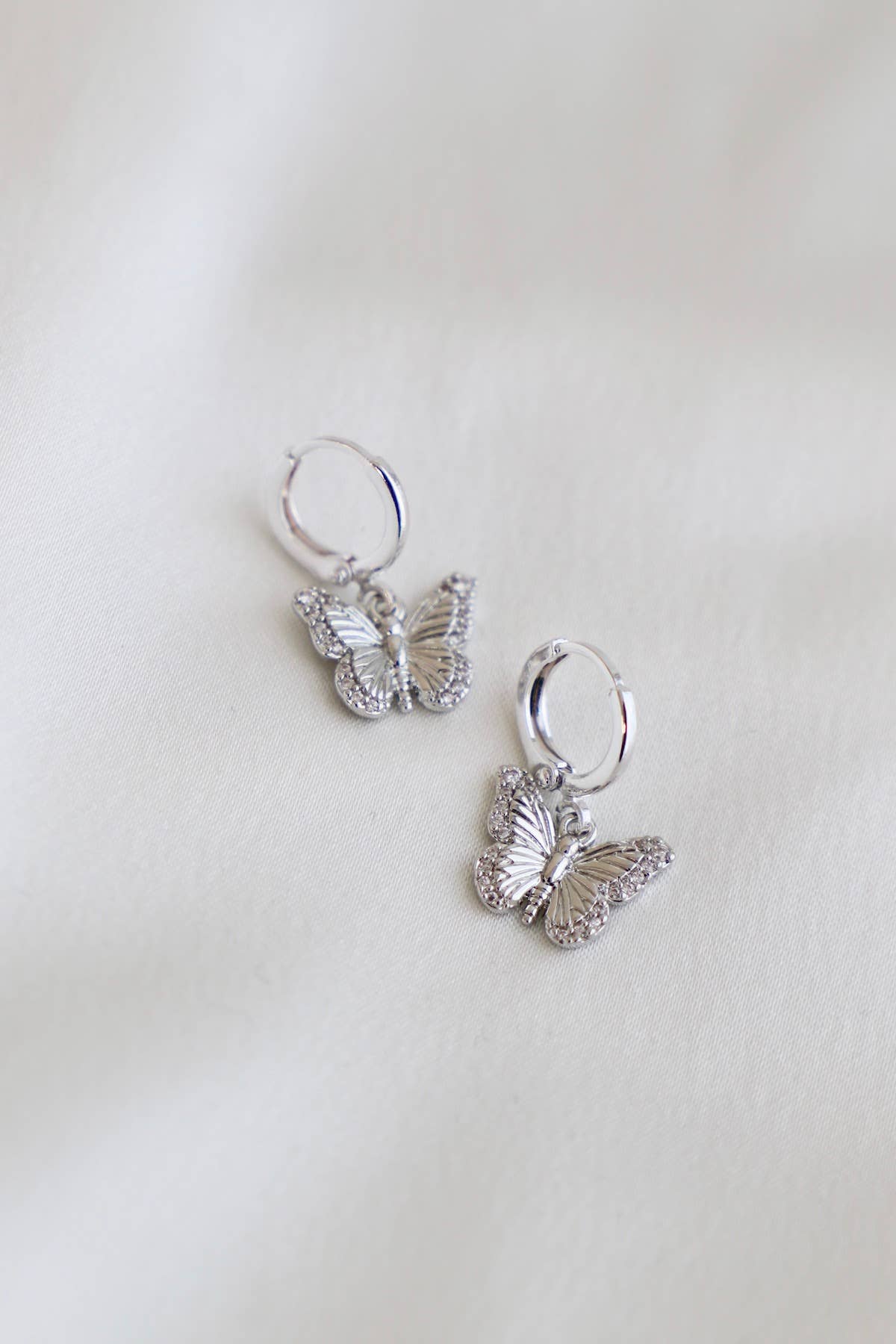 Butterfly Huggie Earrings - Silver