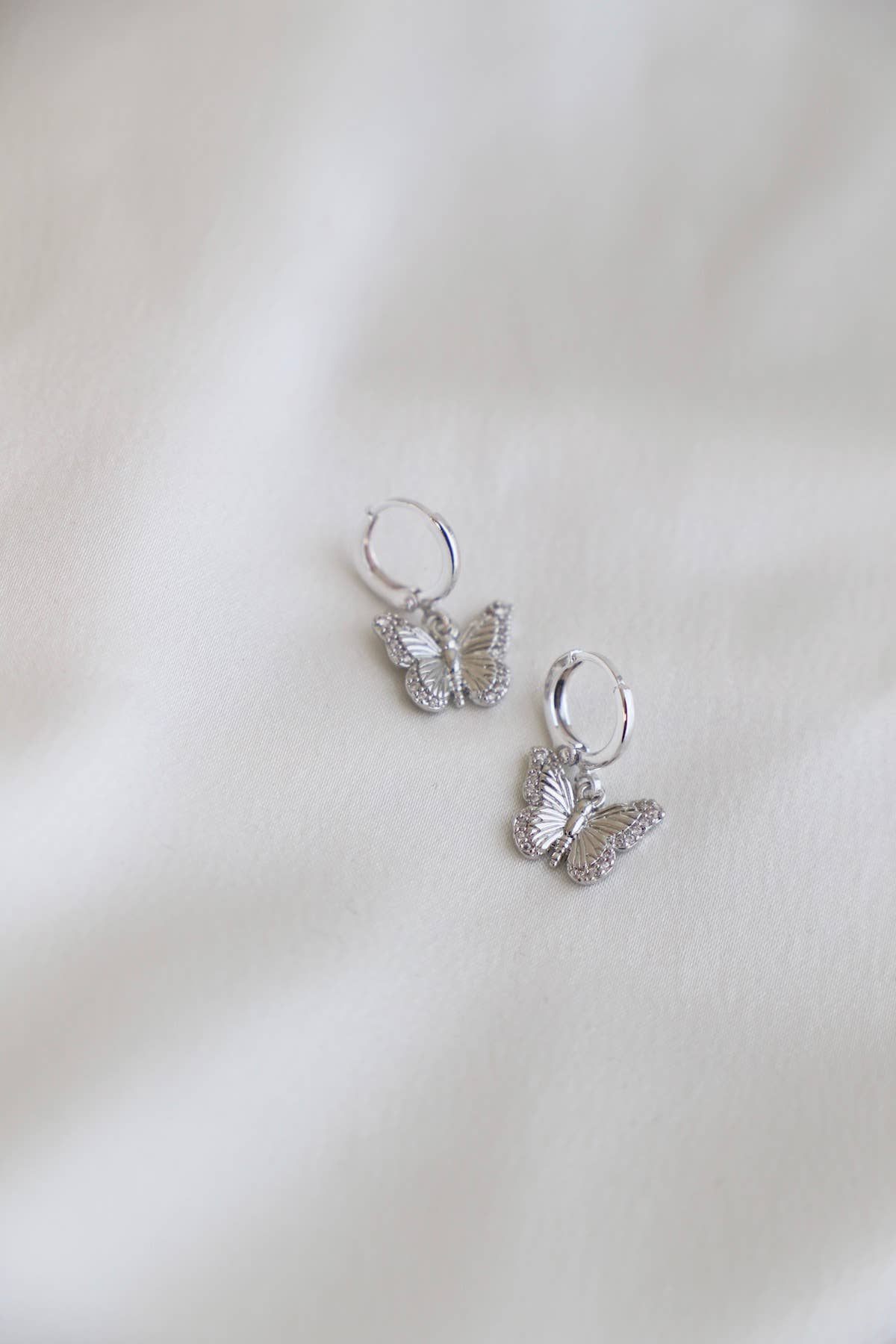 Butterfly Huggie Earrings - Silver